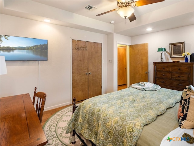 bedroom with a closet and ceiling fan