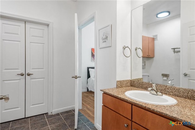 2502 Leon St Unit 201, Austin, TX 78705 - bathroom featuring vanity, baseboards, and tile patterned floors