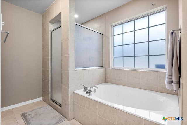 2903 Tucson Dr, Killeen, TX 76543 - bathroom featuring a shower stall, a bath, and tile patterned flooring