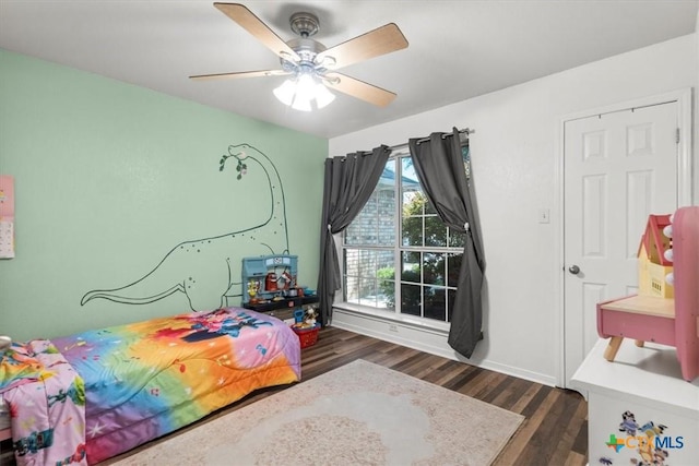 2903 Tucson Dr, Killeen, TX 76543 - bedroom with dark wood-style flooring, ceiling fan, and baseboards