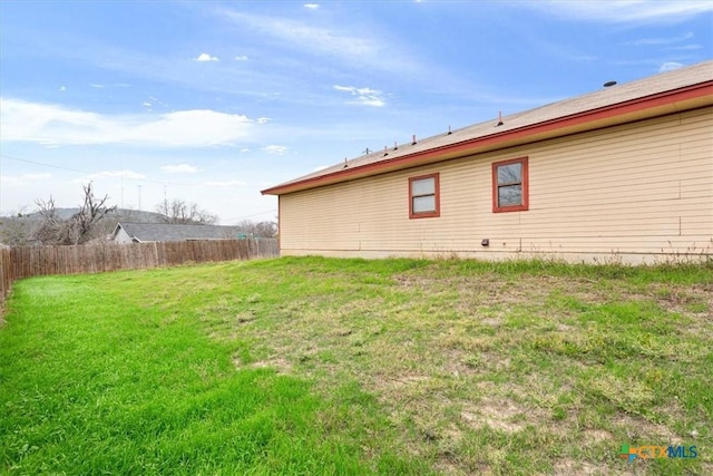 view of home's exterior featuring a lawn