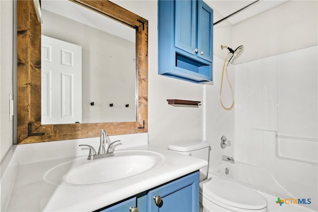 full bathroom with vanity, toilet, and bathtub / shower combination