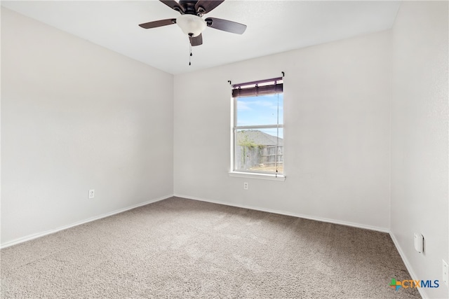 empty room with carpet floors and ceiling fan