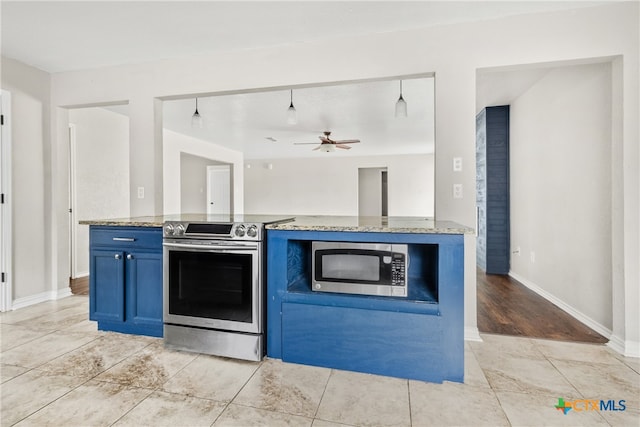 kitchen featuring blue cabinets, ceiling fan, light stone countertops, light wood-type flooring, and appliances with stainless steel finishes