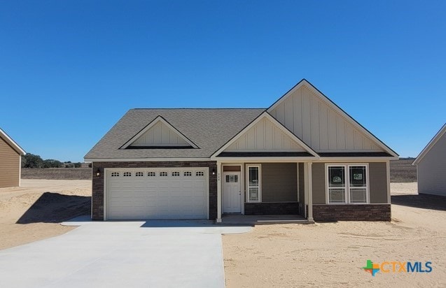 craftsman inspired home with a garage