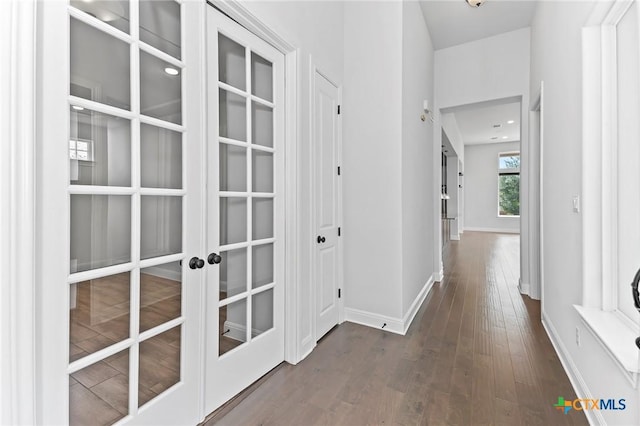 4201 Arques Ave, Round Rock, TX 78681 - corridor featuring baseboards, dark wood finished floors, and french doors