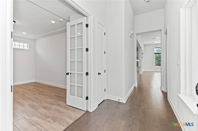 4201 Arques Ave, Round Rock, TX 78681 - hallway with hardwood / wood-style flooring, recessed lighting, and baseboards