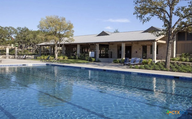 4201 Arques Ave, Round Rock, TX 78681 - community pool with a patio area