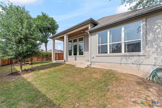 4201 Arques Ave, Round Rock, TX 78681 - back of property featuring stucco siding