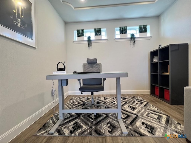 4201 Arques Ave, Round Rock, TX 78681 - office space featuring plenty of natural light, wood finished floors, and baseboards