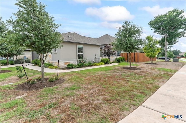 4201 Arques Ave, Round Rock, TX 78681 - view of home's exterior with stucco siding and stone siding
