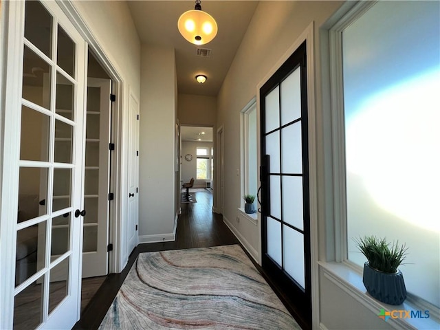 4201 Arques Ave, Round Rock, TX 78681 - corridor featuring french doors, dark wood-style floors, and baseboards