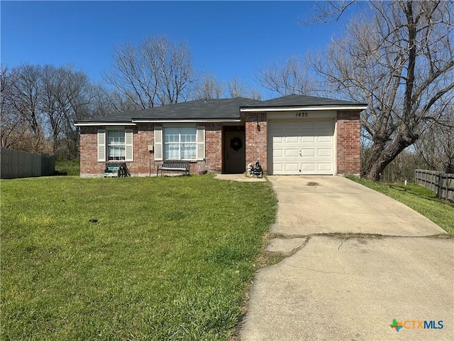 ranch-style house featuring a front yard, fence, driveway, a garage, and brick siding