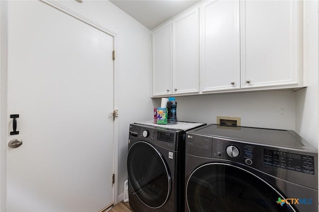 4010 Halfway Cv, Round Rock, TX 78681 - clothes washing area featuring cabinet space and washer and clothes dryer