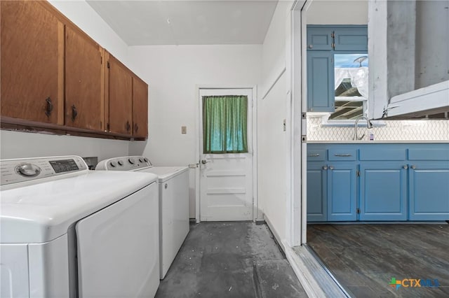 2307 Crescent Dr, Copperas Cove, TX 76522 - washroom with cabinet space and washing machine and dryer