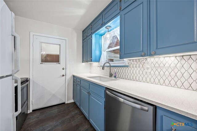 2307 Crescent Dr, Copperas Cove, TX 76522 - kitchen with appliances with stainless steel finishes, blue cabinets, decorative backsplash, and light countertops