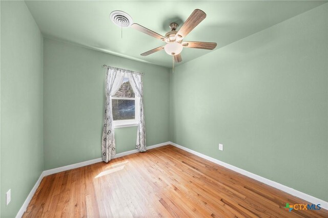 2307 Crescent Dr, Copperas Cove, TX 76522 - empty room featuring a ceiling fan and wood finished floors