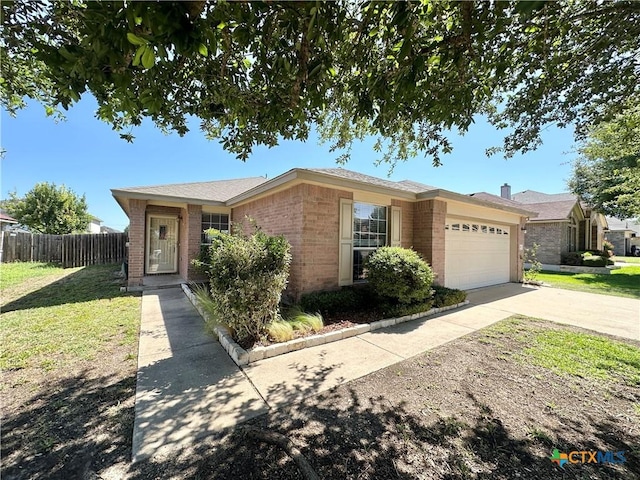4609 Golden Gate Dr, Killeen, TX 76549 - single story home with brick siding, a garage, and concrete driveway