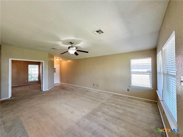 4609 Golden Gate Dr, Killeen, TX 76549 - carpeted spare room with a textured ceiling and a ceiling fan