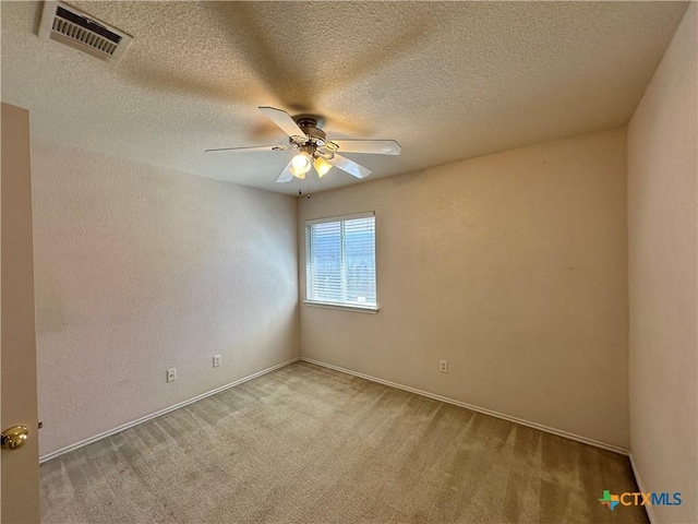 4609 Golden Gate Dr, Killeen, TX 76549 - empty room featuring ceiling fan, carpet floors, a textured ceiling, and a textured wall