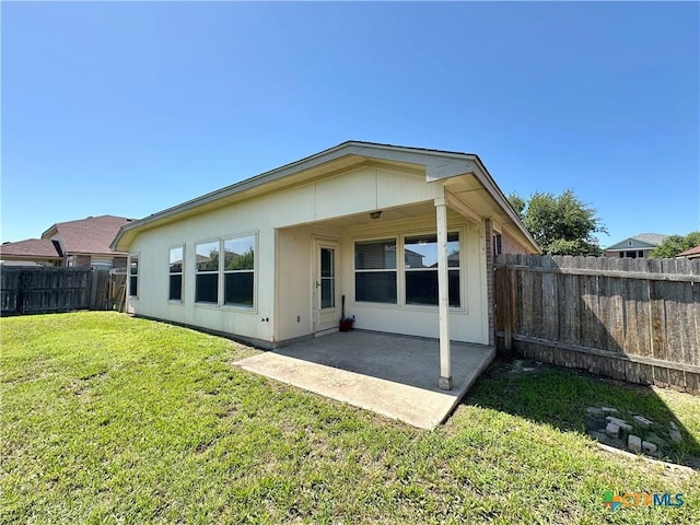 4609 Golden Gate Dr, Killeen, TX 76549 - rear view of property featuring a patio area and a fenced backyard