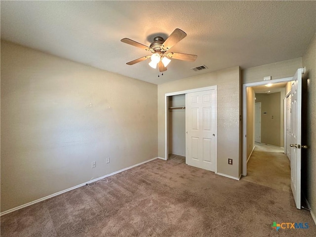 4609 Golden Gate Dr, Killeen, TX 76549 - unfurnished bedroom with carpet floors, a closet, ceiling fan, and a textured ceiling