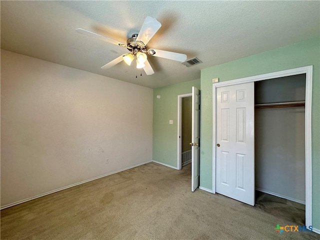 4609 Golden Gate Dr, Killeen, TX 76549 - unfurnished bedroom featuring carpet, a closet, ceiling fan, and a textured ceiling