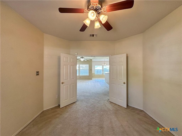 4609 Golden Gate Dr, Killeen, TX 76549 - spare room with light colored carpet and ceiling fan