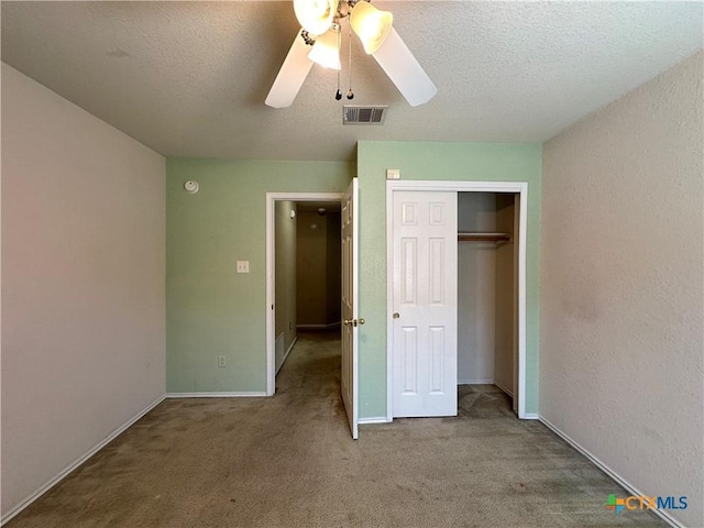 4609 Golden Gate Dr, Killeen, TX 76549 - unfurnished bedroom featuring carpet floors, a textured ceiling, a closet, and a ceiling fan