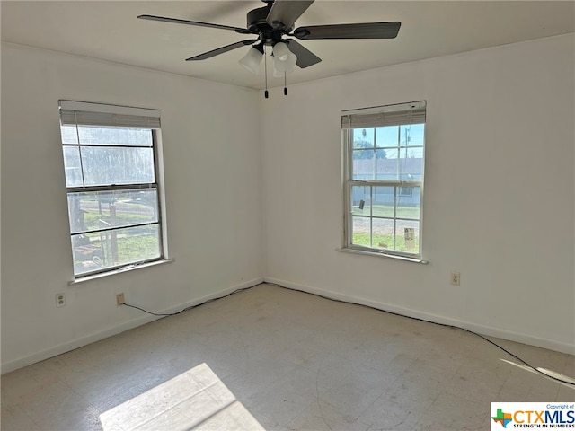 unfurnished room featuring ceiling fan