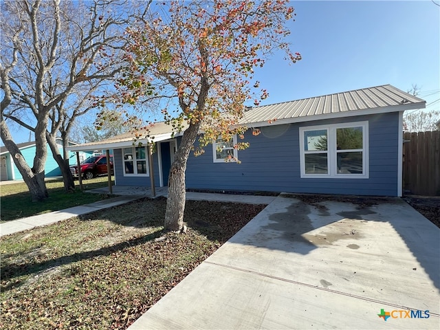 ranch-style house with a front lawn