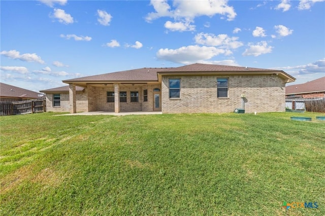 1117 Myrtle Dr, Copperas Cove, TX 76522 - rear view of house featuring brick siding and a patio