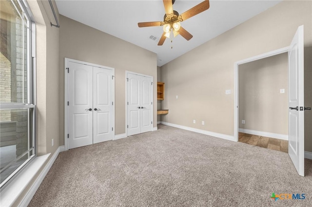 1117 Myrtle Dr, Copperas Cove, TX 76522 - unfurnished bedroom with carpet flooring, multiple closets, and a ceiling fan