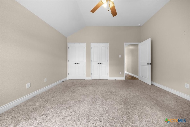 1117 Myrtle Dr, Copperas Cove, TX 76522 - unfurnished bedroom with multiple closets, lofted ceiling, carpet flooring, and a ceiling fan