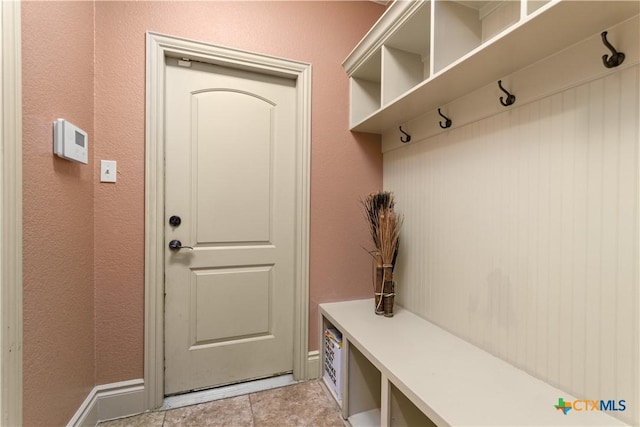 mudroom featuring light tile patterned floors