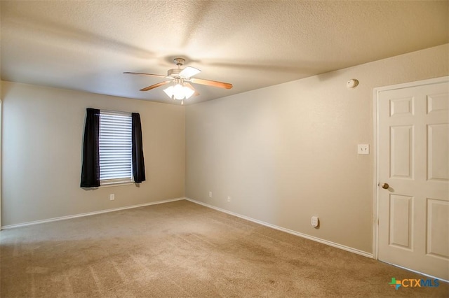 3903 Kevin Shaw Dr, Killeen, TX 76549 - empty room featuring a ceiling fan, carpet floors, a textured ceiling, and a smoke detector