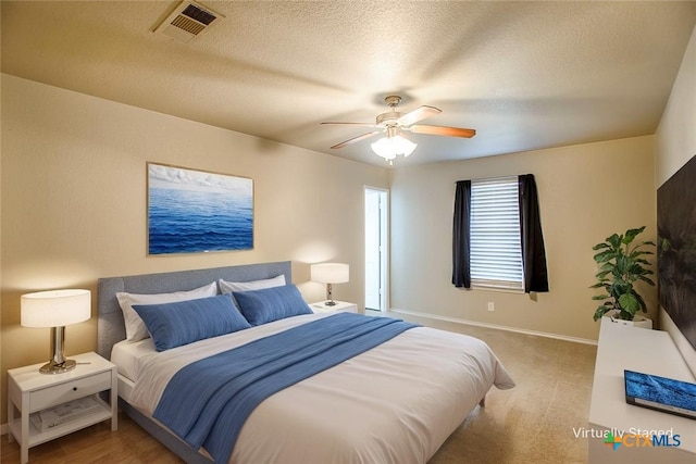3903 Kevin Shaw Dr, Killeen, TX 76549 - bedroom featuring a textured ceiling and a ceiling fan