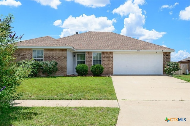 3903 Kevin Shaw Dr, Killeen, TX 76549 - single story home featuring brick siding, a garage, and a front yard