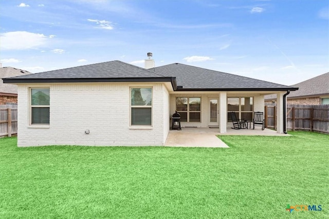 2619 Settlers Oak Dr, Belton, TX 76513 - rear view of property with a patio area, fence, brick siding, and a yard