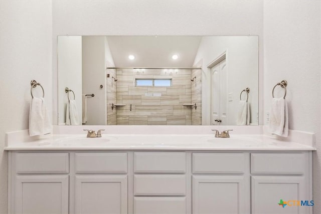 2619 Settlers Oak Dr, Belton, TX 76513 - full bath featuring double vanity, a tile shower, recessed lighting, and a sink