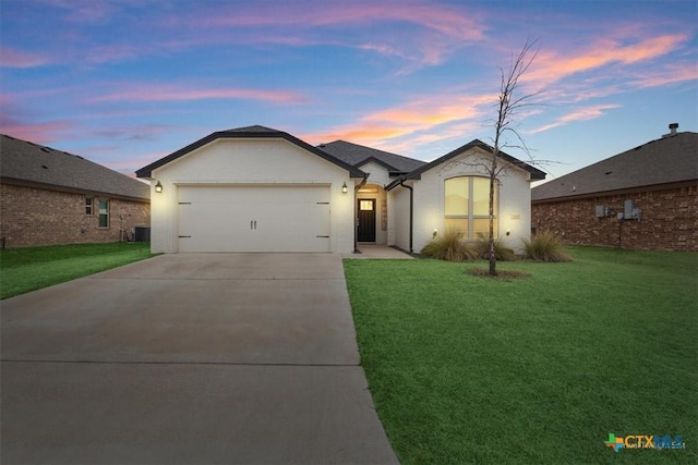 2619 Settlers Oak Dr, Belton, TX 76513 - ranch-style home featuring a front lawn, driveway, and an attached garage