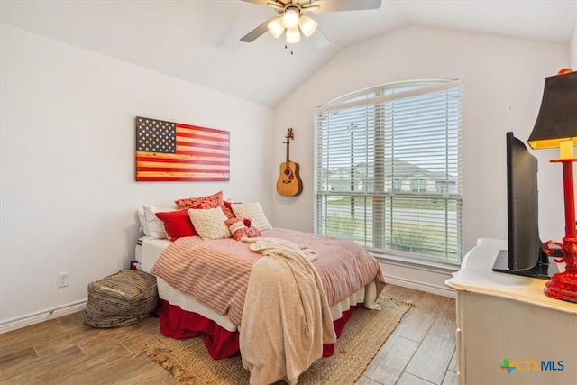2619 Settlers Oak Dr, Belton, TX 76513 - bedroom featuring vaulted ceiling, multiple windows, and light wood-type flooring