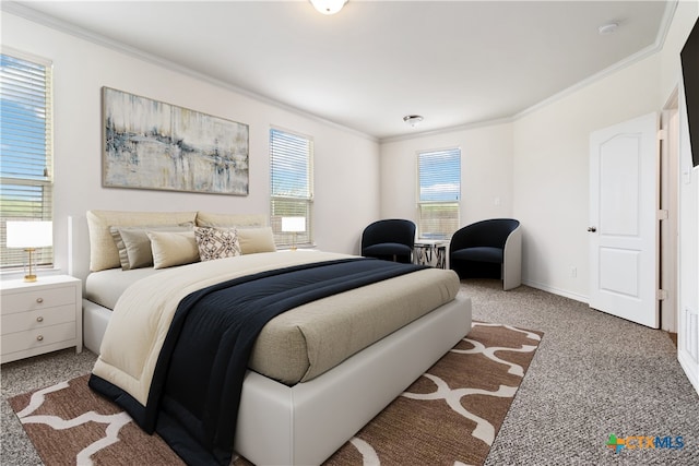 bedroom featuring multiple windows, light carpet, and ornamental molding