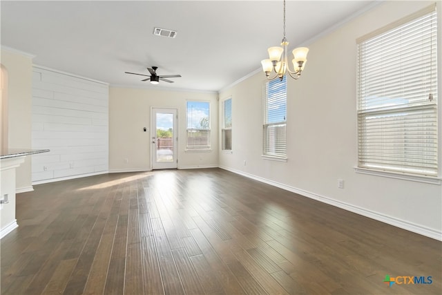 unfurnished living room with ornamental molding, ceiling fan with notable chandelier, and dark wood-type flooring