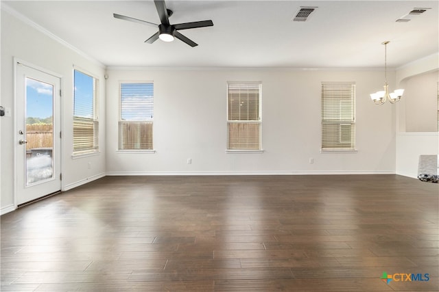 unfurnished living room featuring dark wood-type flooring, crown molding, and ceiling fan with notable chandelier