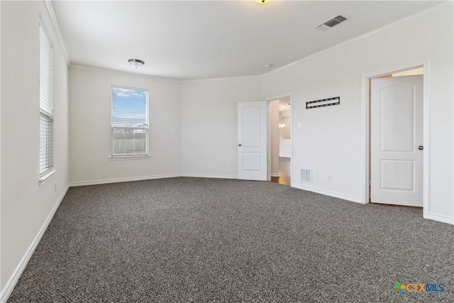 carpeted empty room with crown molding