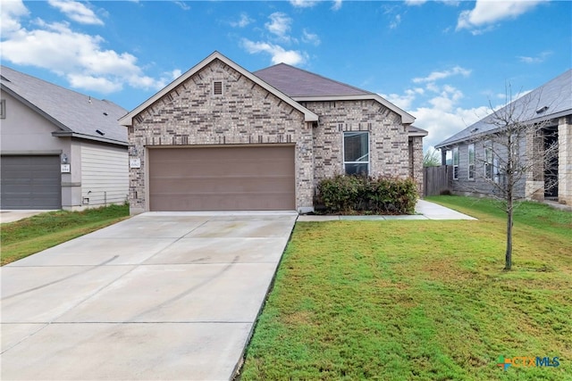 view of front facade featuring a garage and a front yard