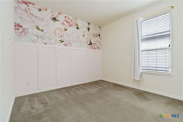 unfurnished bedroom with light colored carpet