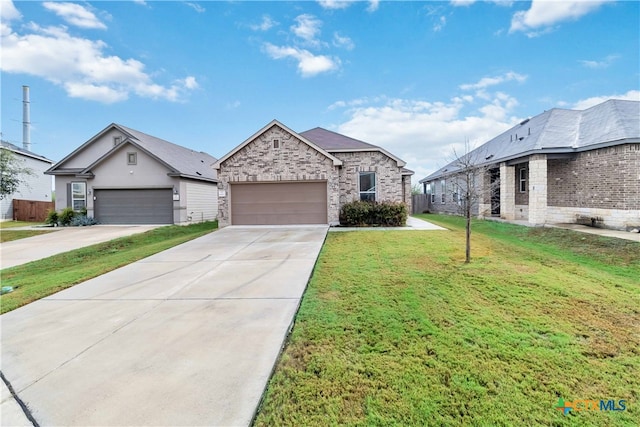 view of front of home featuring a garage and a front yard