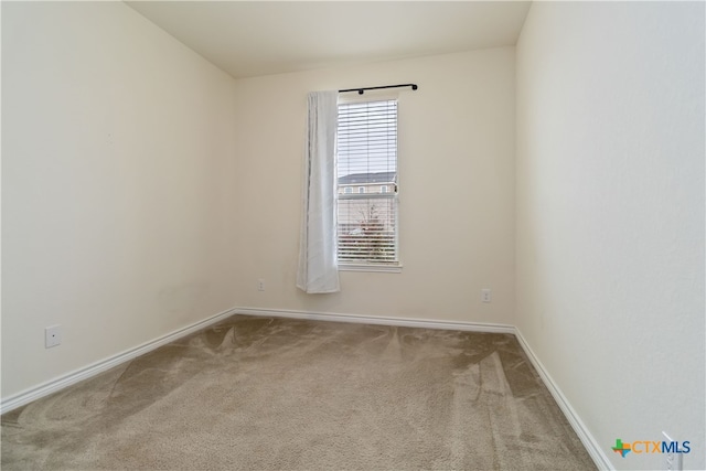 empty room featuring carpet flooring